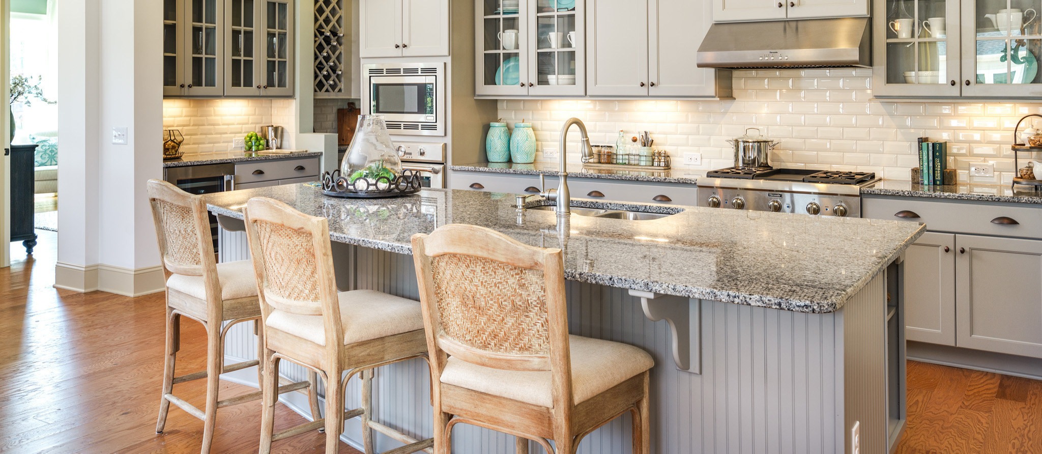 Kitchen with a luxurious complete stone backsplash matching the countertops.