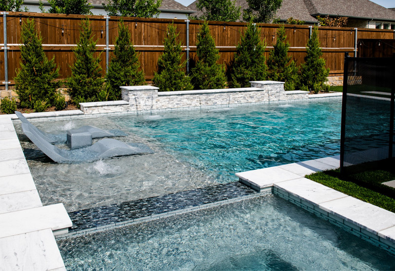Charlotte NC luxury pool with natural stone decking