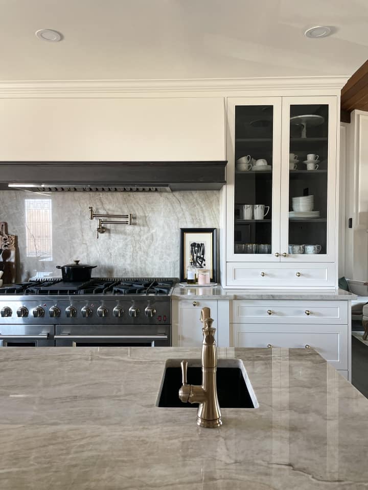 Open concept kitchen with Taj Mahal countertops